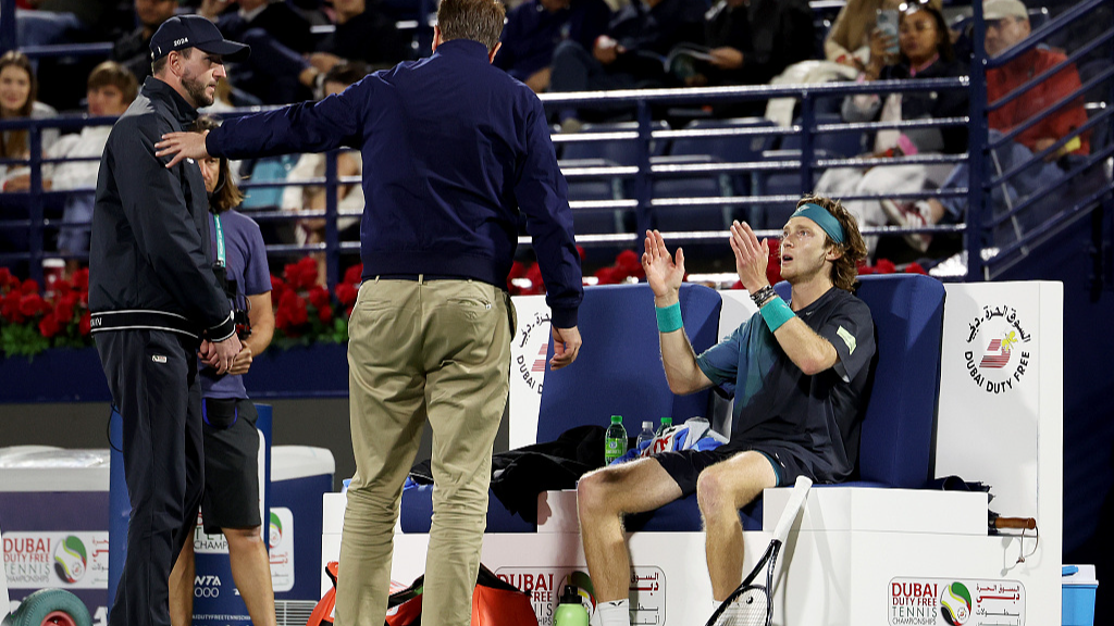 Andrey Rublev (R) is dismissed by the court supervisor after shouting at a line judge while playing Alexander Bublik in their semifinal match at the Dubai Duty Free Tennis Championships in Dubai, United Arab Emirates, March 1, 2024. /CFP