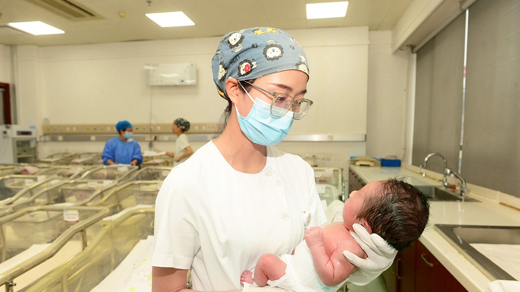 Medical staff taking care of newborns in a local hospital in Lanzhou City, northwest China's Gansu Province, February 28, 2024. /CFP