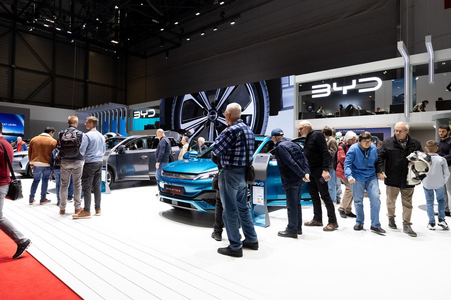 People visit the booth of BYD at the 91st Geneva International Motor Show in Geneva, Switzerland, February 28, 2024. /Xinhua
