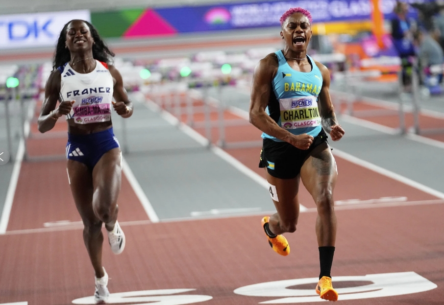 Devynne Charlton (R) of Bahamas crosses the finishing line during the women's 60-meter hurdles final at the World Athletics Indoor Championships in Glasgow, Scotland, March 3, 2024. /CFP