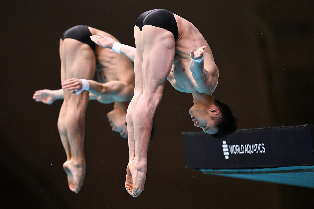 Yang Hao and Lian Junjie of China compete in the men's 10-meter synchronized platform final at the World Aquatics Fiving World Cup in Montreal, Canada, March 3, 2024. /CFP