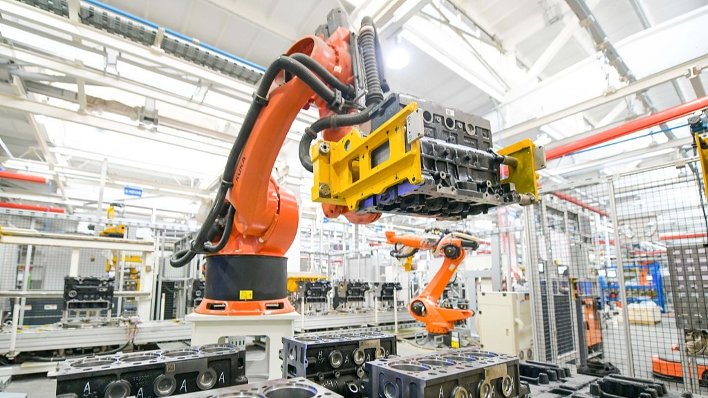 Robotic arms assemble diesel engines at a factory in central China's Henan Province, January 23, 2024. /CFP