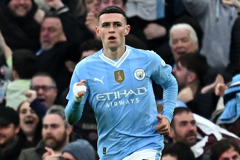 Manchester City's Phil Foden celebrates after scoring their first goal during their clash with Manchester United at Etihad Stadium in Manchester, England, March 3, 2024. /CFP
