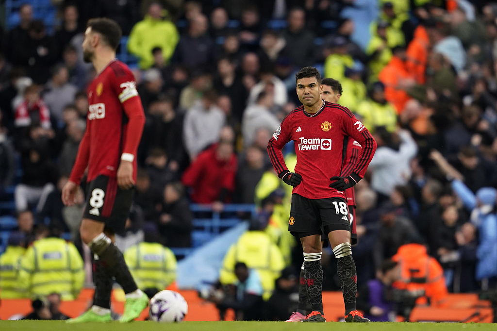 Manchester United's Casemiro (R) and Bruno Fernandes react after their clash with Manchester City at Etihad Stadium in Manchester, England, March 3, 2024. /CFP