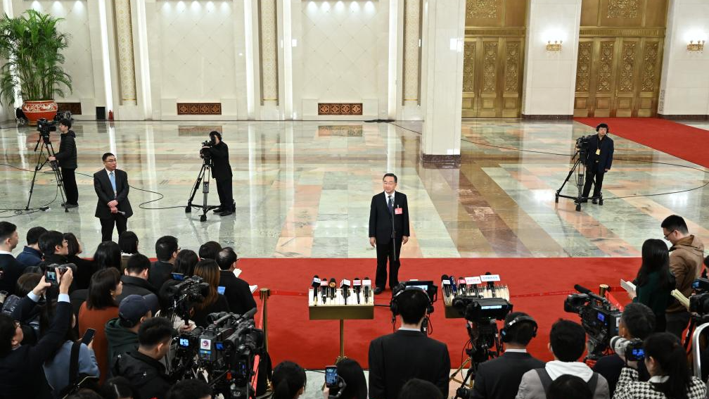 Chinese Minister of Agriculture and Rural Affairs Tang Renjian speaks to the media after the opening meeting of the second session of the 14th NPC at the Great Hall of the People in Beijing, China, March 5, 2024. /Xinhua