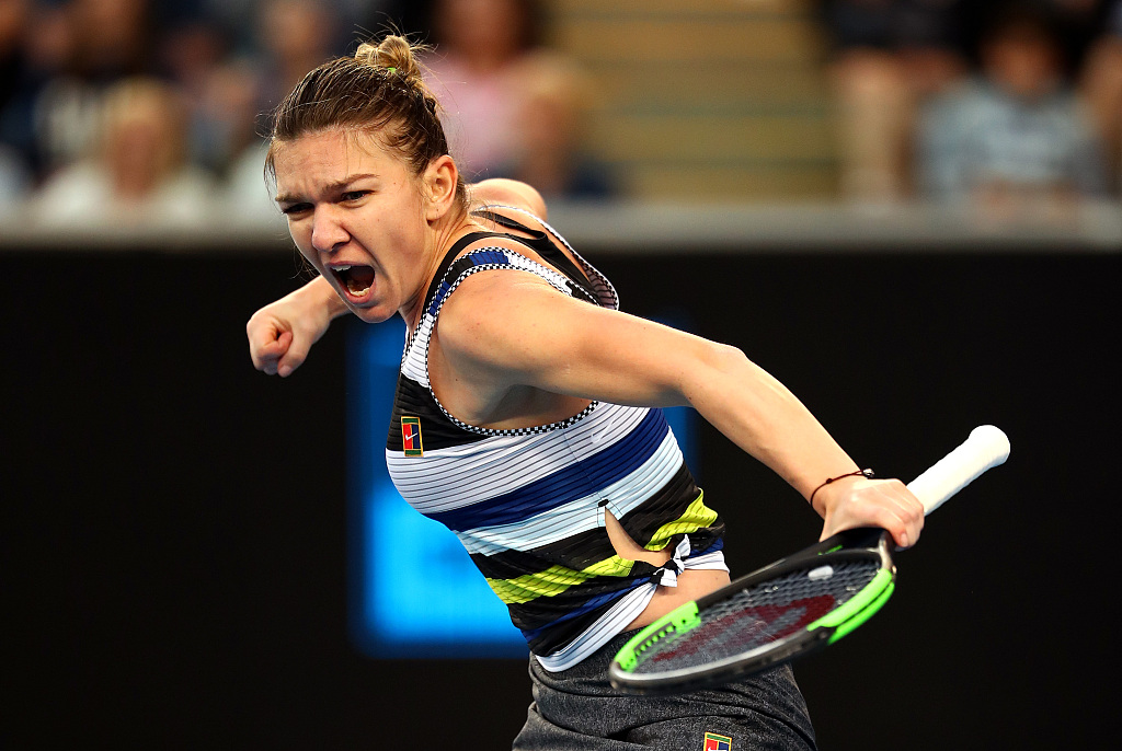 Simona Halep of Romania celebrates winning a point in her third round of the Australian Open at Melbourne Park in Melbourne, Australia, January 19, 2019. /CFP