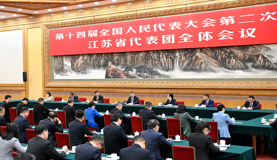 Chinese President Xi Jinping takes part in a deliberation with deputies from the delegation of Jiangsu Province at the second session of the 14th National People's Congress in Beijing, China, March 5, 2024. /Xinhua
