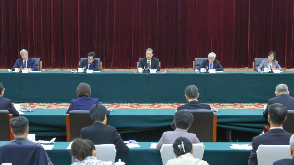 Zhao Leji, a member of the Standing Committee of the Political Bureau of the Communist Party of China Central Committee and chairman of the National People's Congress Standing Committee, attends a joint group meeting of political advisors from the China Democratic League and the Chinese Peasants and Workers Democratic Party at the second session of the 14th National Committee of the Chinese People's Political Consultative Conference in Beijing, capital of China, March 6, 2024. /Xinhua