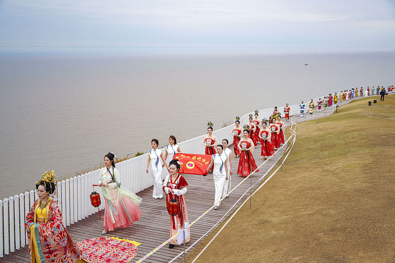 Women dressed in various styles of traditional Chinese attire take part in a fashion show in Cangnan County, Zhejiang Province, March 6, 2024. /CFP