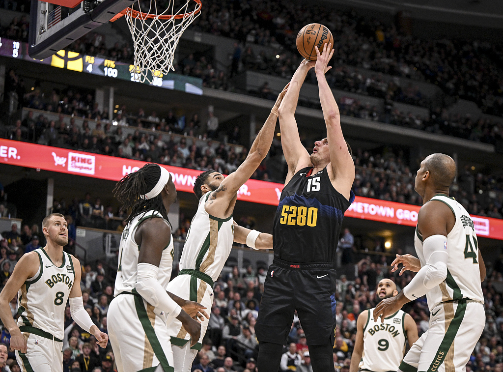 Nikola Jokic (#15) of the Denver Nuggets shoots in the game against the Boston Celtics at Ball Arena in Denver, Colorado, March 7, 2024. /CFP