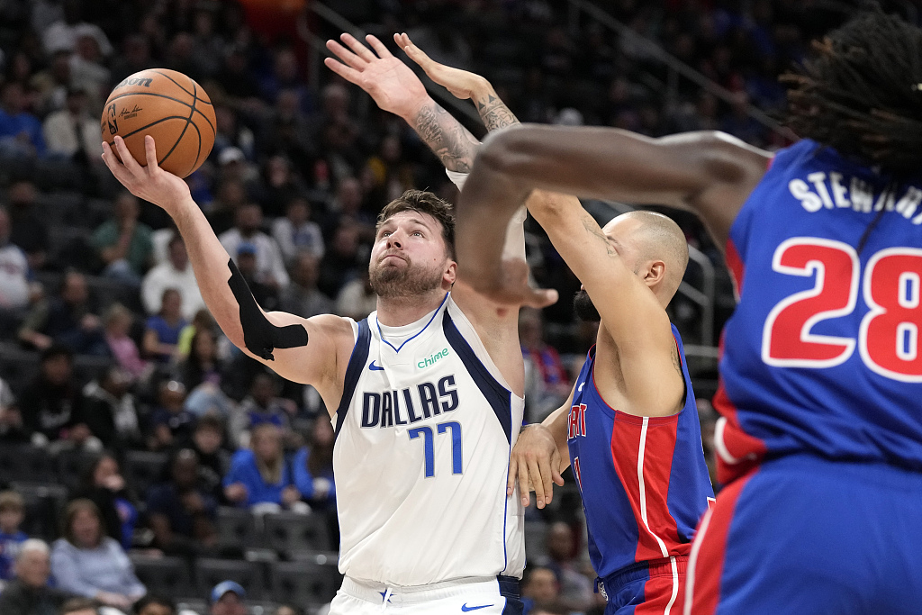 Dallas Mavericks guard Luka Doncic (#77) is defended by Detroit Pistons guard Evan Fournier during their NBA game in Detroit, U.S., March 9, 2024, /CFP