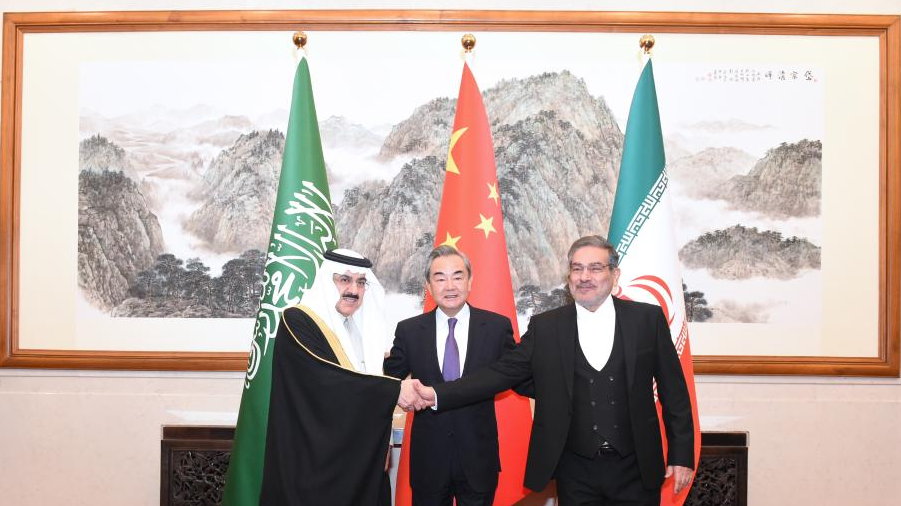 Wang Yi (C), a member of the Political Bureau of the Communist Party of China (CPC) Central Committee and director of the Office of the Foreign Affairs Commission of the CPC Central Committee, attends a closing meeting of the talks between the Saudi delegation led by Musaad bin Mohammed Al-Aiban (L), Saudi Arabia's Minister of State, Member of the Council of Ministers and National Security Advisor, and Iranian delegation led by Admiral Ali Shamkhani (R), Secretary of the Supreme National Security Council of Iran, in Beijing, China, March 10, 2023. /Xinhua