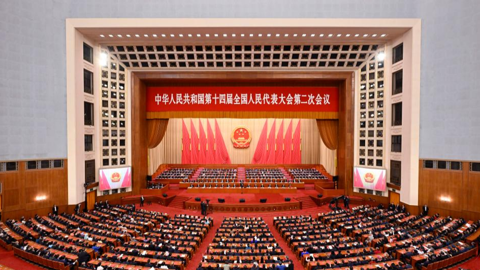 China's top legislature holds closing meeting of annual session