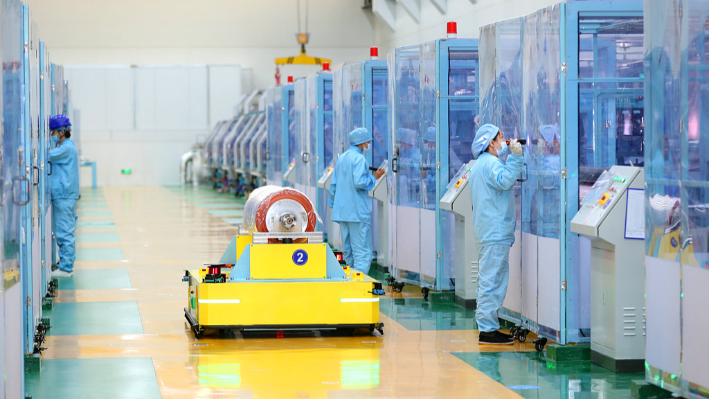 An automated guided vehicle assists the production workshop in automatically transferring finished products in Dongyang, east China's Zhejiang Province, January 12, 2024. /CFP 