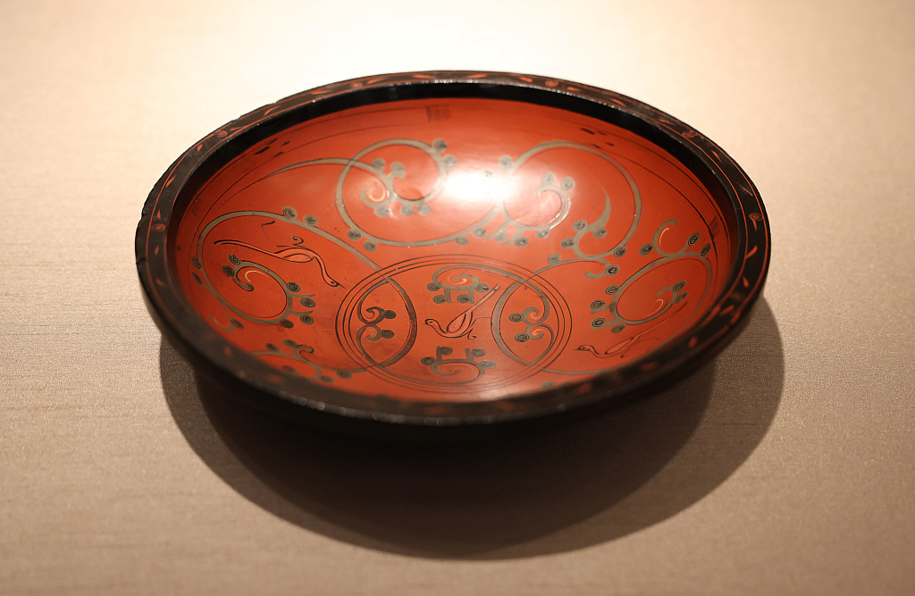 A lacquer artifact is on display at a themed exhibition at the Liangzhu Museum in Hangzhou, Zhejiang Province, March 10, 2024. /CFP