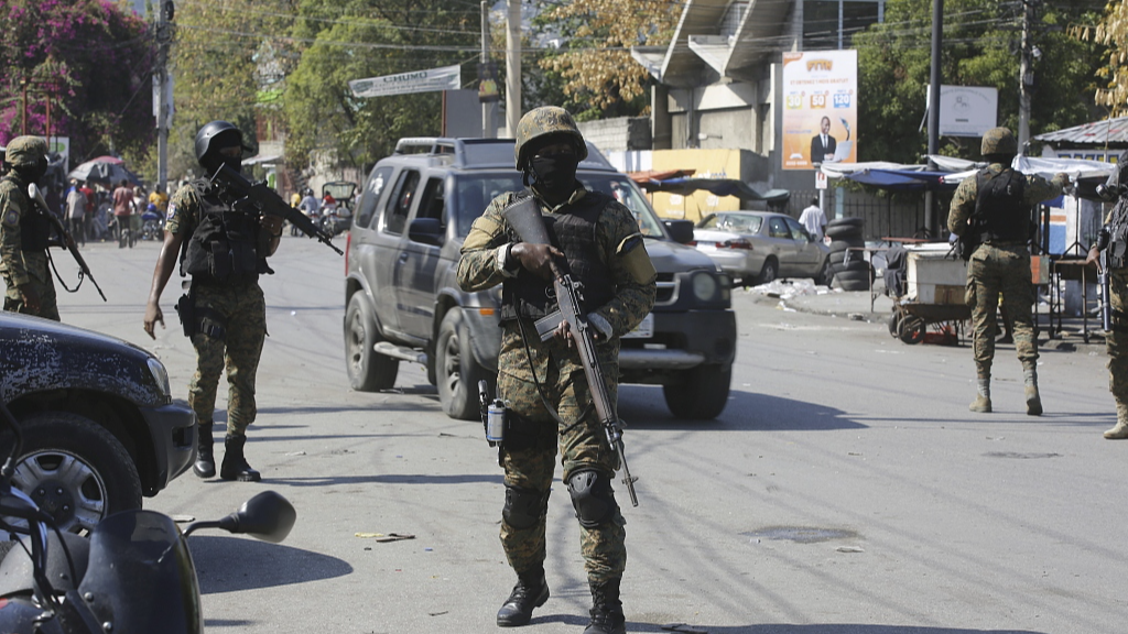 Members of the General Security Unit of the National Palace set up a security perimeter after armed gang members tried to seize the National Palace in Port-au-Prince, Haiti, March 9, 2024. /CFP