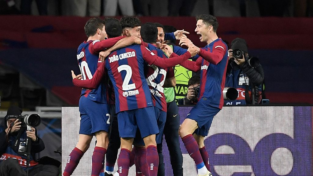 Barcelona players celebrate their third goal during the UEFA Champions League last 16 second-leg match against Napoli in Barcelona, Spain, March 12, 2024. /CFP
