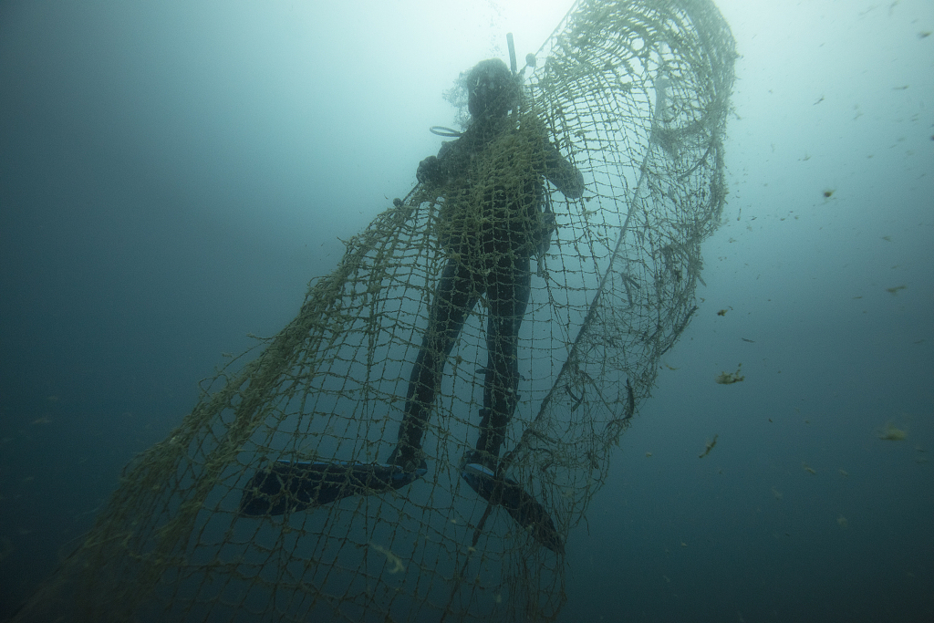 A diver clears ghost nets in Izmir, Türkiye, August 30, 2022.