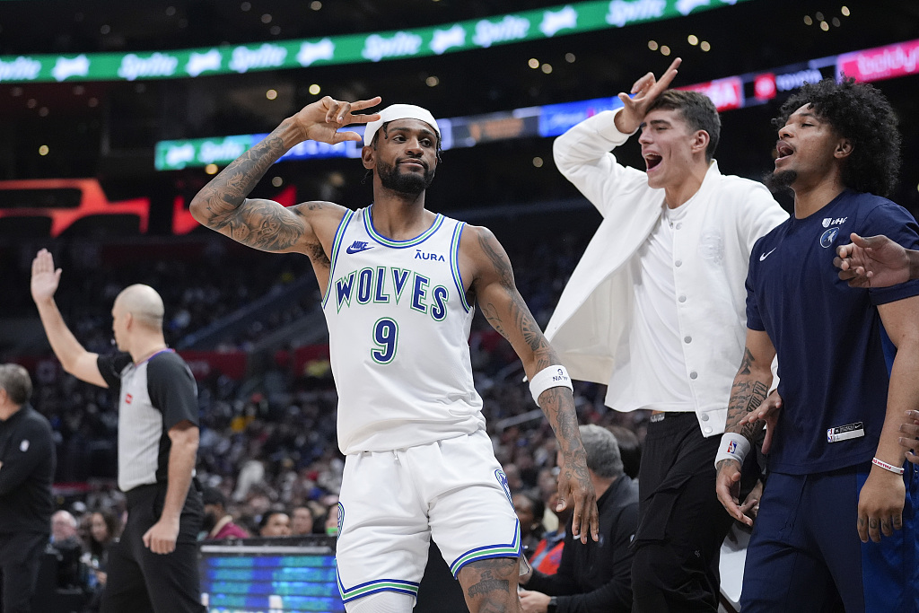 Nickeil Alexander-Walker (#9) of the Minnesota Timberwolves reacts after making a 3-pointer in the game against the Los Angeles Clippers at Crypto.com Arena in Los Angeles, California, March 12, 2024. /CFP