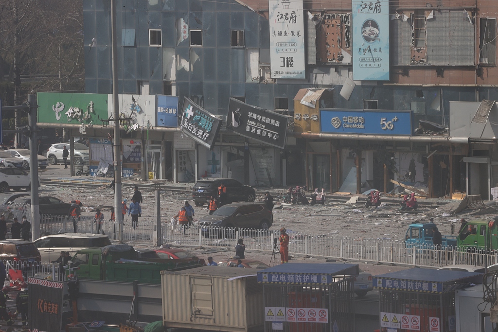 Several cars were damaged and there was debris all around after a gas blast took place at a fried chicken restaurant in Sanhe City, north China's Hebei Province, March 13, 2024. /CFP