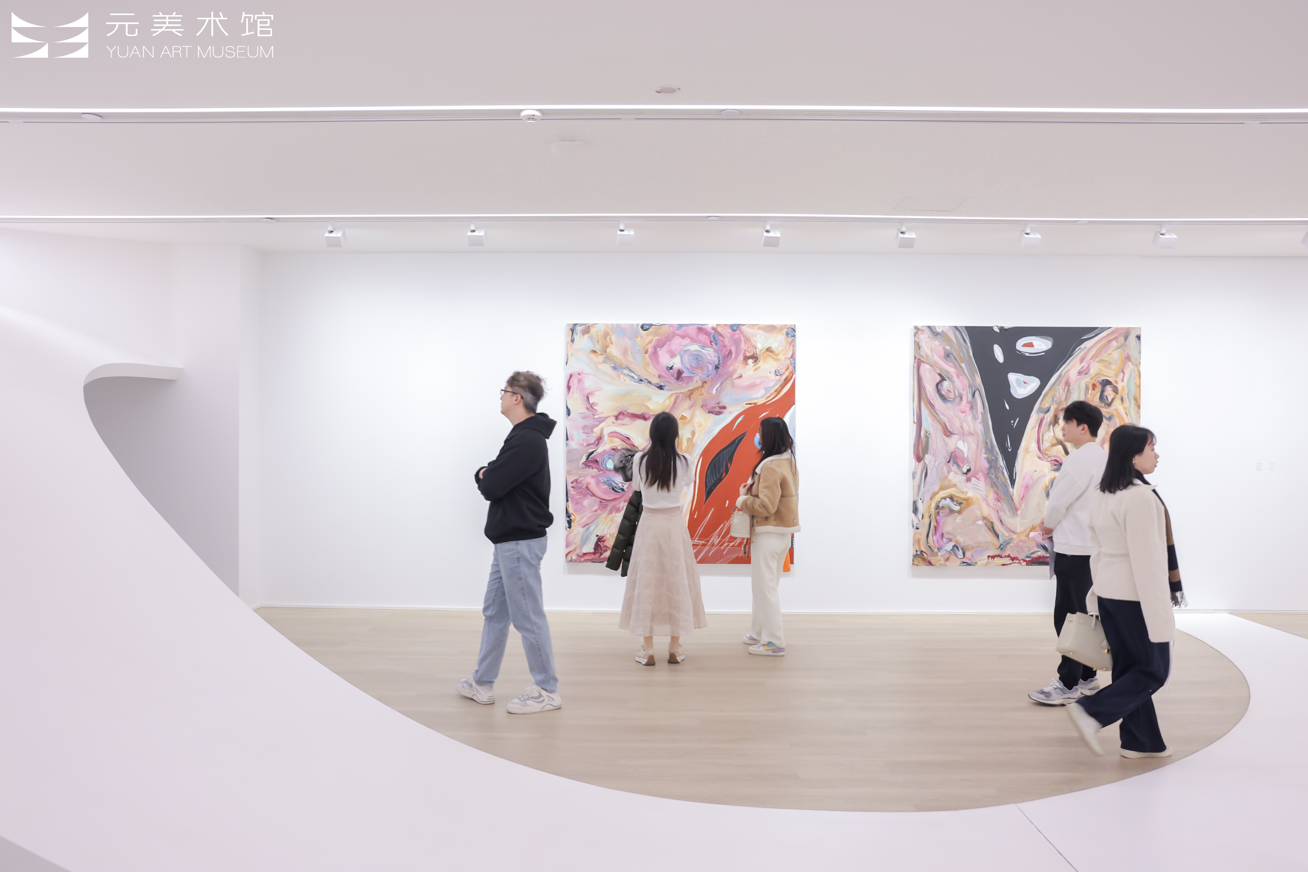 Visitors look at Manuel Mathieu's artworks. /Photo courtesy of Yuan Art Museum