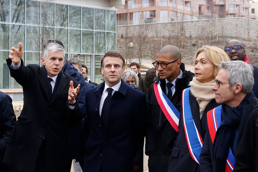 France's President Emmanuel Macron (2nd L) visits the Paris 2024 Olympic Village in Paris, France, February 29, 2024. /CFP