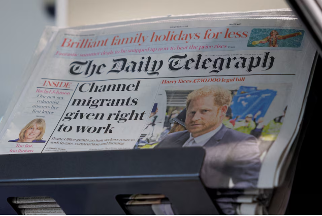 Copies of The Daily Telegraph are displayed on a rack in a supermarket in London, Britain, January 20, 2024. /Reuters