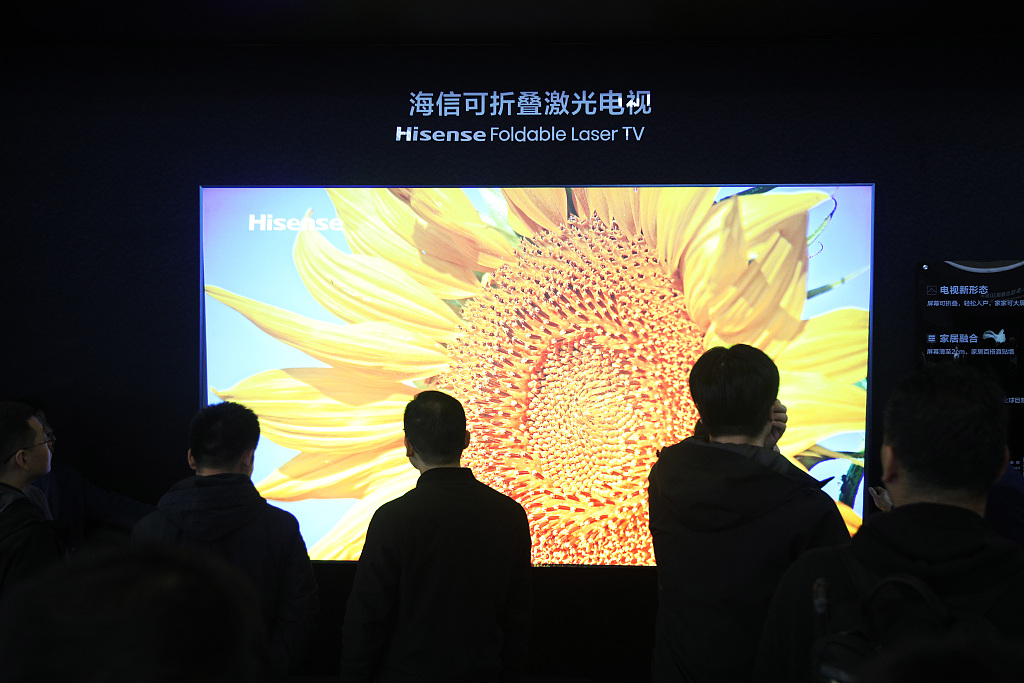 Visitors check out the Hisense foldable laser TV at AWE2024, Shanghai Municipality, east China, March 14, 2024. /CFP
