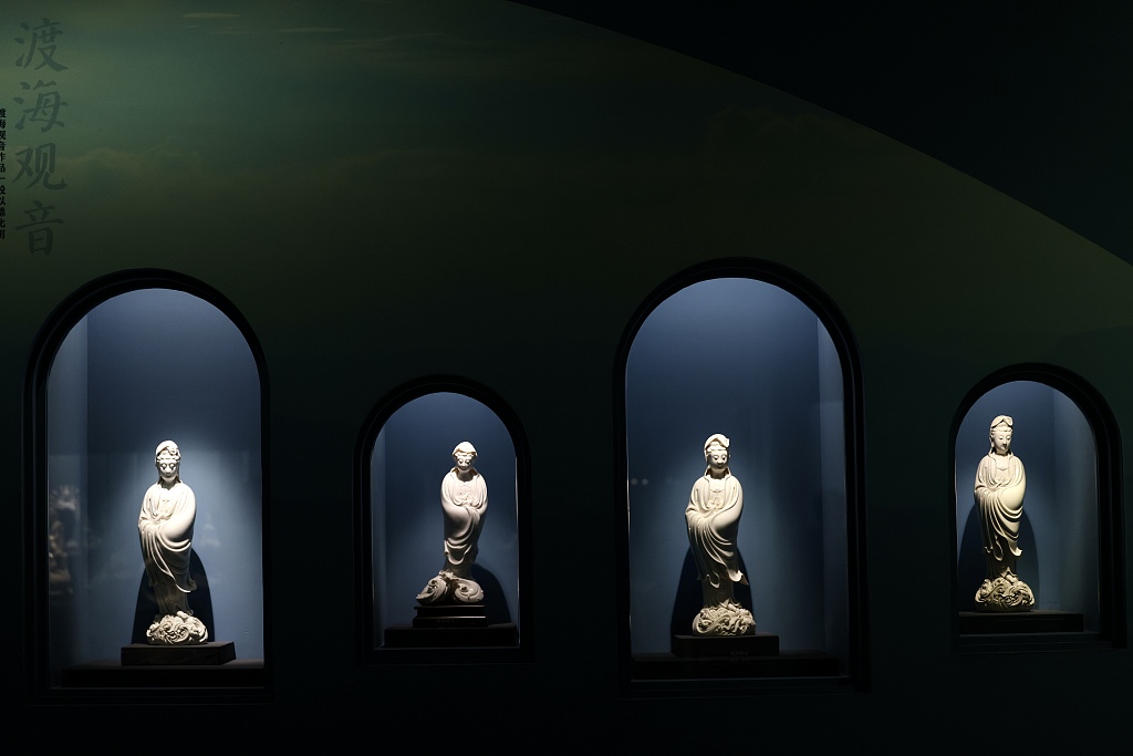 A photo taken on March 15, 2024 shows some pieces of Dehua white porcelain artworks on display at the National Museum of China in Beijing. /CFP