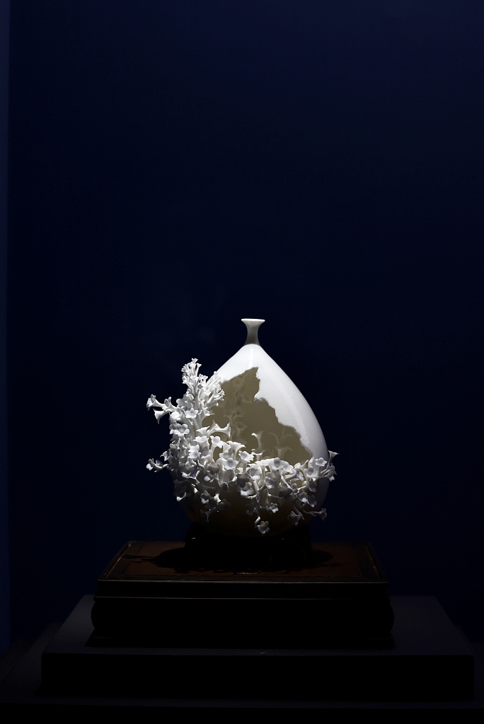 A photo taken on March 15, 2024 shows a piece of Dehua white porcelain artwork on display at the National Museum of China in Beijing. /CFP