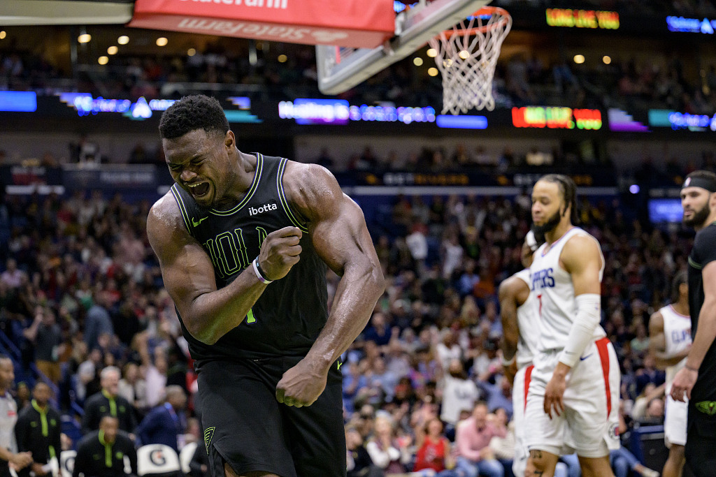 Zion Williamson (L) of the New Orleans Pelicans reacts after making a shot in the game against the Los Angeles Clippers at Smoothie King Center in New Orleans, Louisiana, March 15, 2024. /CFP
