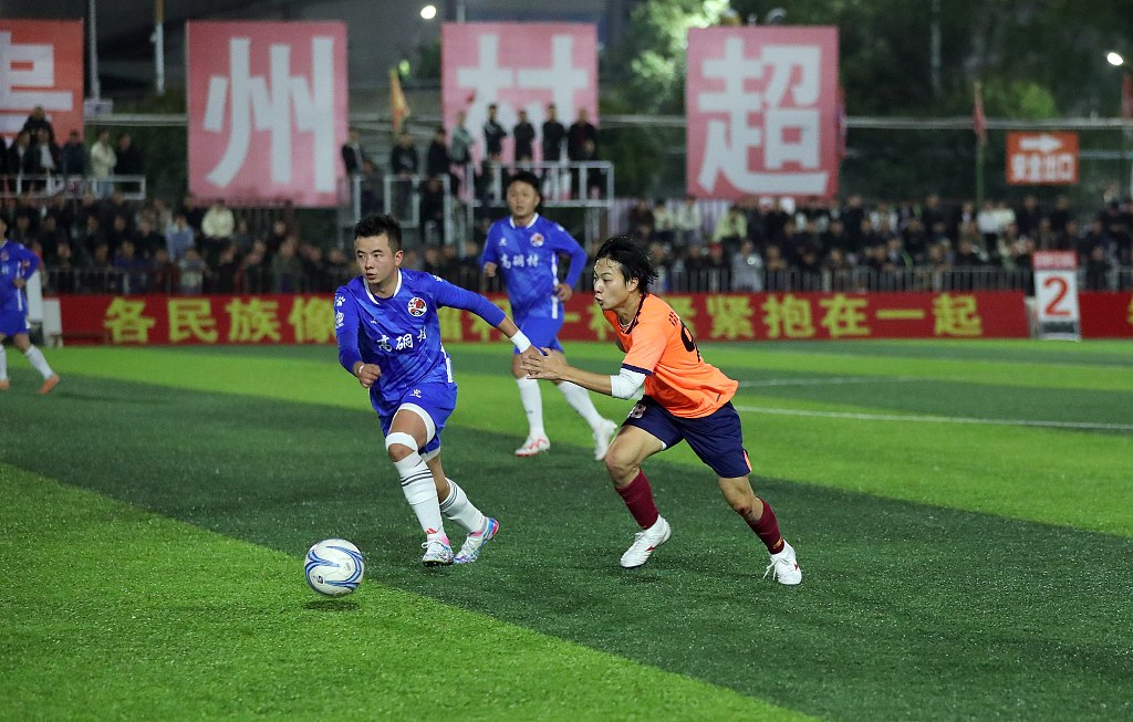 Players in action during the Village Super League match between Zhaihao Township Paawang Village Team and Zaima Township Gaotong Village Team in Rongjiang, China, January 18, 2024. /CFP