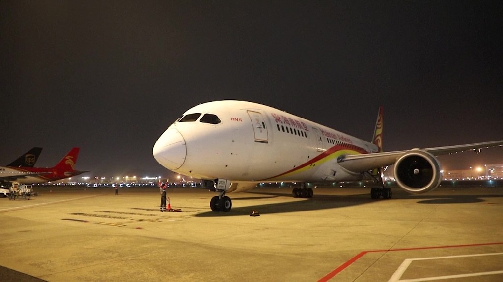 A video screenshot of a flight with international passengers arriving at Shenzhen Baoan International Airport, China, March 14. /CMG