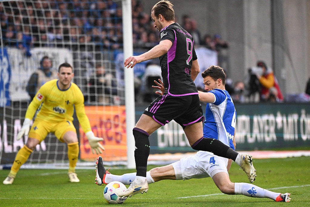 Bayern Munich's Harry Kane gets through a goal during their clash with Darmstadt at Merck-Stadion in Darmstadt, Germany, March 16, 2024. /CFP