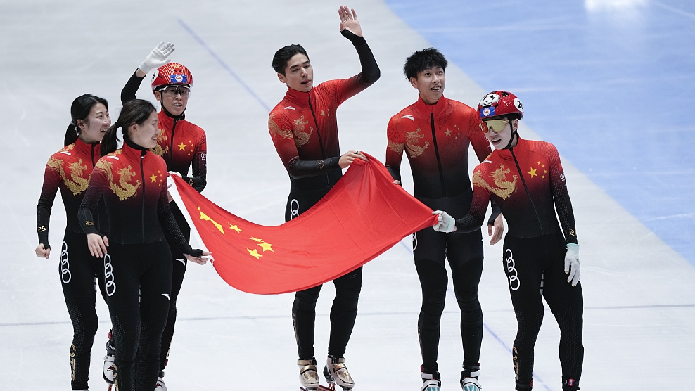 Chinese team members celebrate winning the final of the mixed relay at the World Championships at Ahoy Arena in Rotterdam, Netherlands, March 17, 2024. /CFP