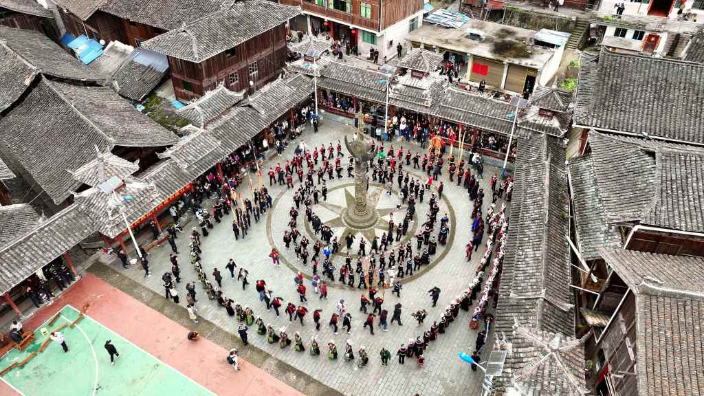 An aerial photo of the Xiaodanjiang Miao Ethnic Village in Rongjiang County, southwest China's Guizhou Province, where the Miao ethnic group is holding their Zhaolong Festival on March 17, 2024. /CFP