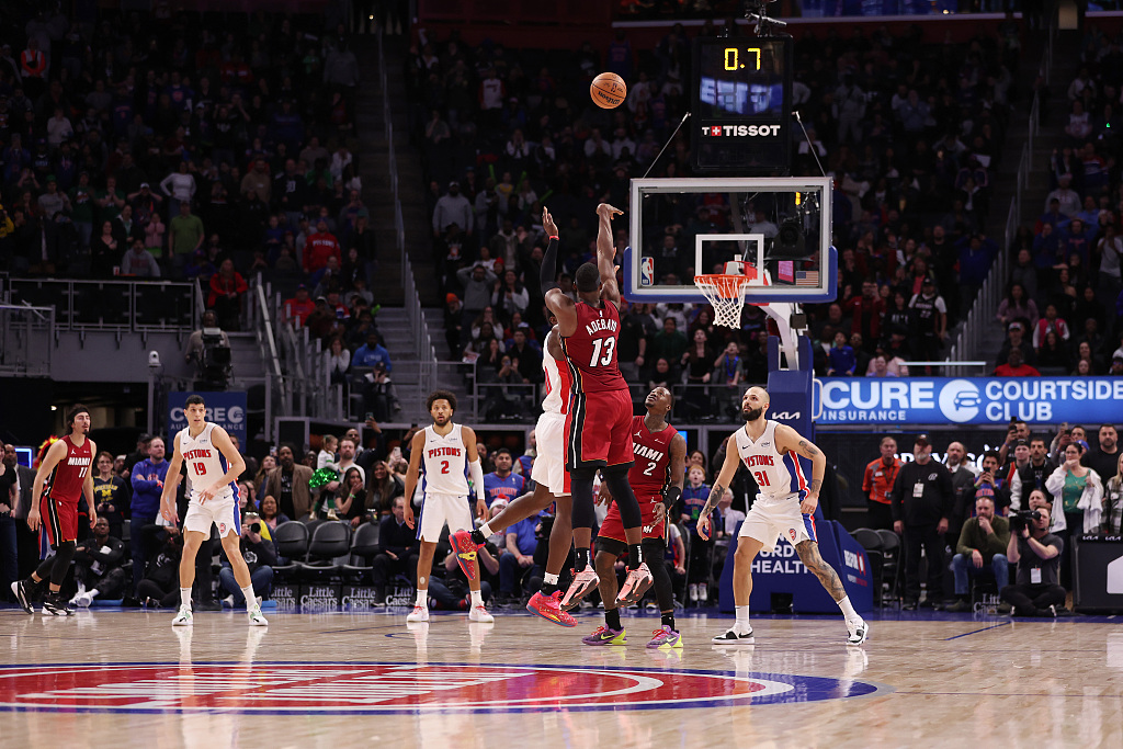 Bam Adebayo (#13) of the Miami Heat shoots to beat the buzzer in the game against the Detroit Pistons at Little Caesars Arena in Detroit, Michigan, March 17, 2024. /CFP