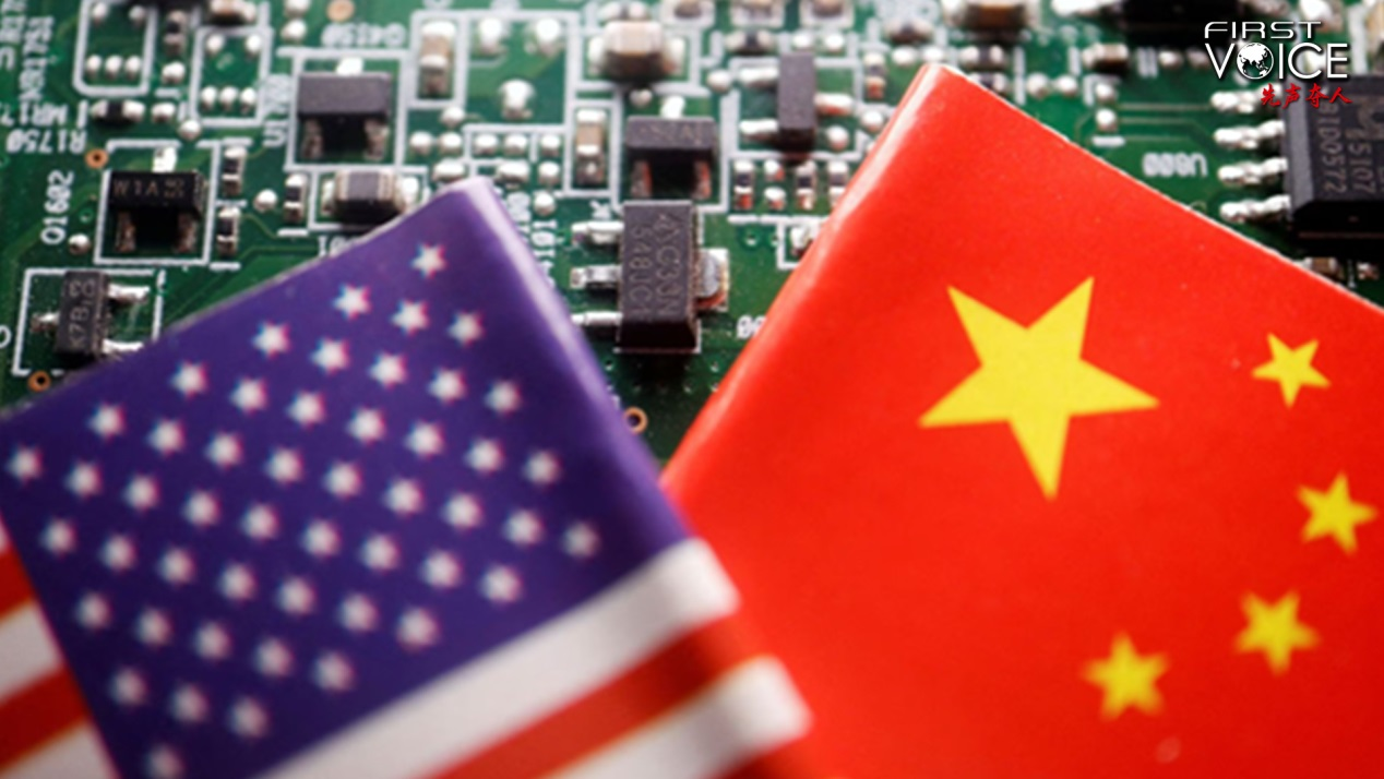Flags of China and the U.S. are displayed over a printed circuit board with semiconductor chips in this illustration. /Reuters