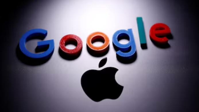 A 3D printed Google logo is placed on the Apple Macbook in this illustration taken April 12, 2020. /Reuters