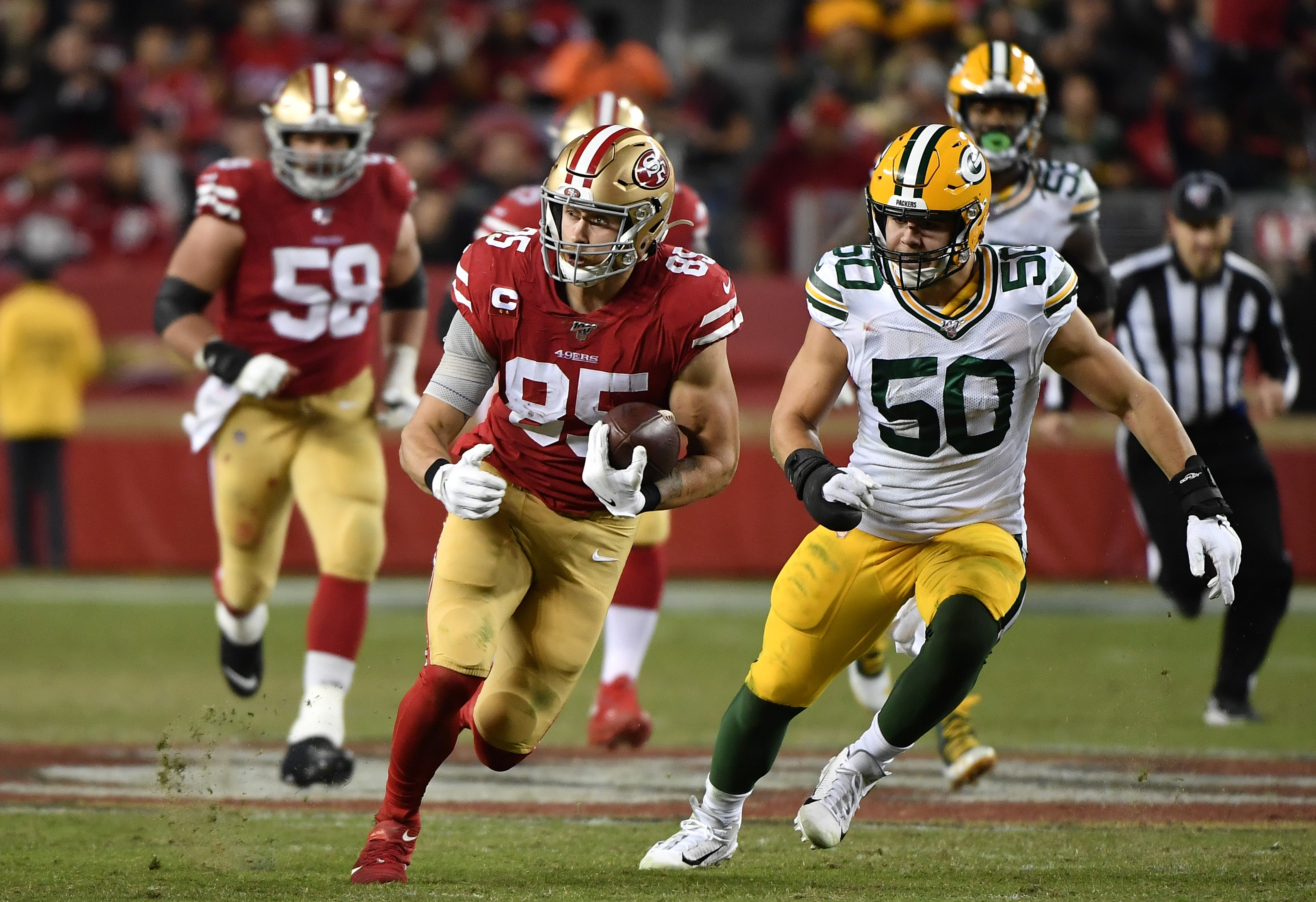 George Kittle #85 of the San Francisco 49ers runs with the ball in the game against the Green Bay Packers at Levi's Stadium, November 24, 2019. /CFP