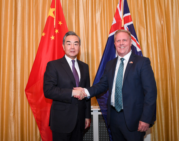 Chinese Foreign Minister Wang Yi (L), also a member of the Political Bureau of the CPC Central Committee, meets with New Zealand Trade Minister Todd McClay in Wellington, New Zealand, March 18, 2024. /Chinese Foreign Ministry