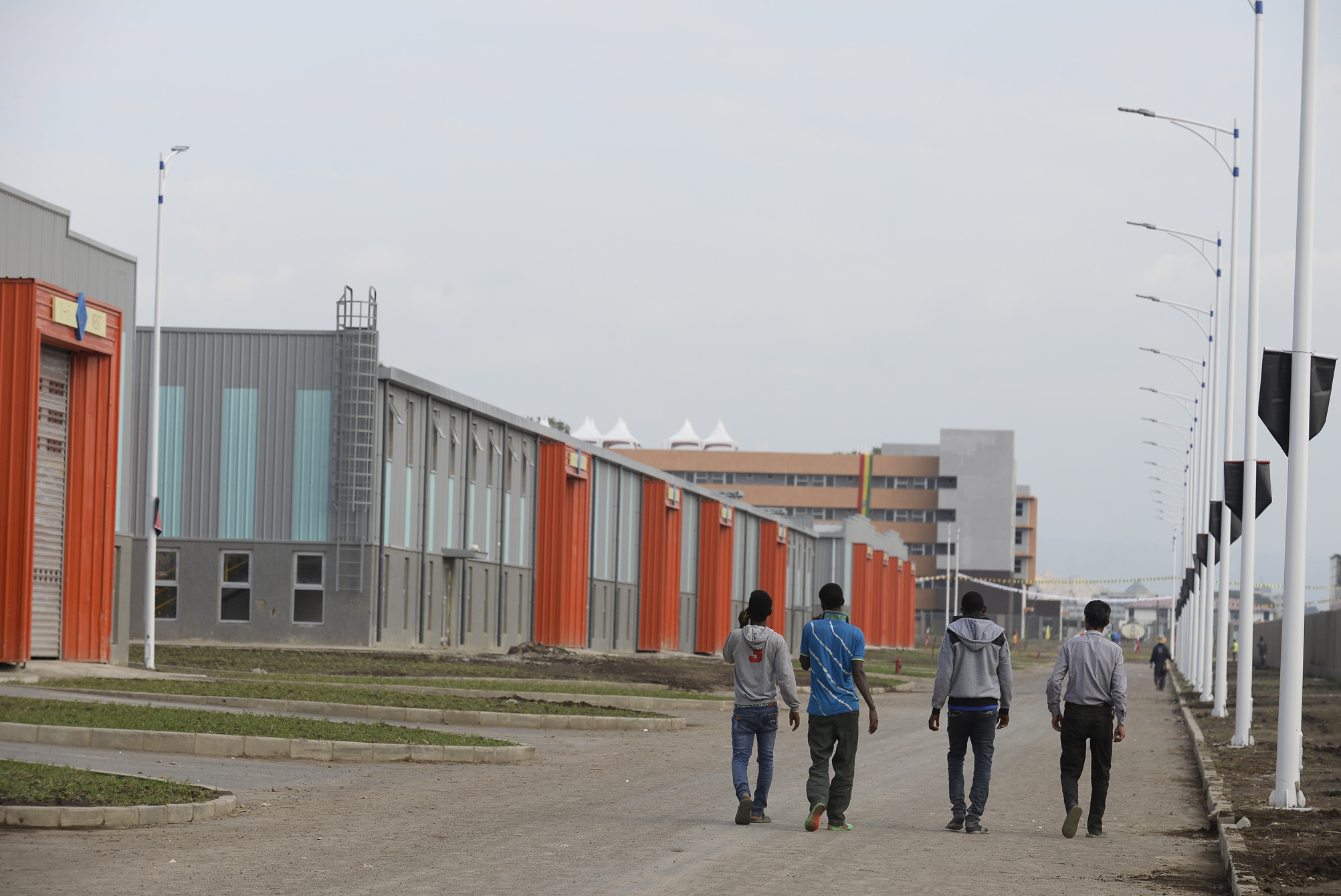 People walk past the Hawassa Industrial Park in Hawassa, Ethiopia. /Xinhua