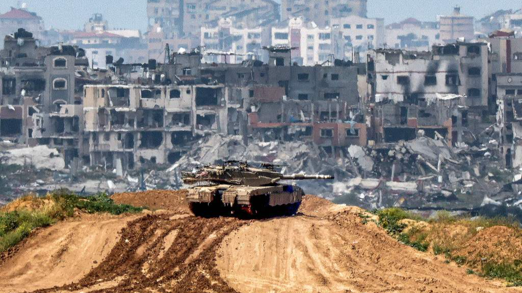 An Israeli army battle tank at a position along the border with the Palestinian territory, March 19, 2024. /CFP