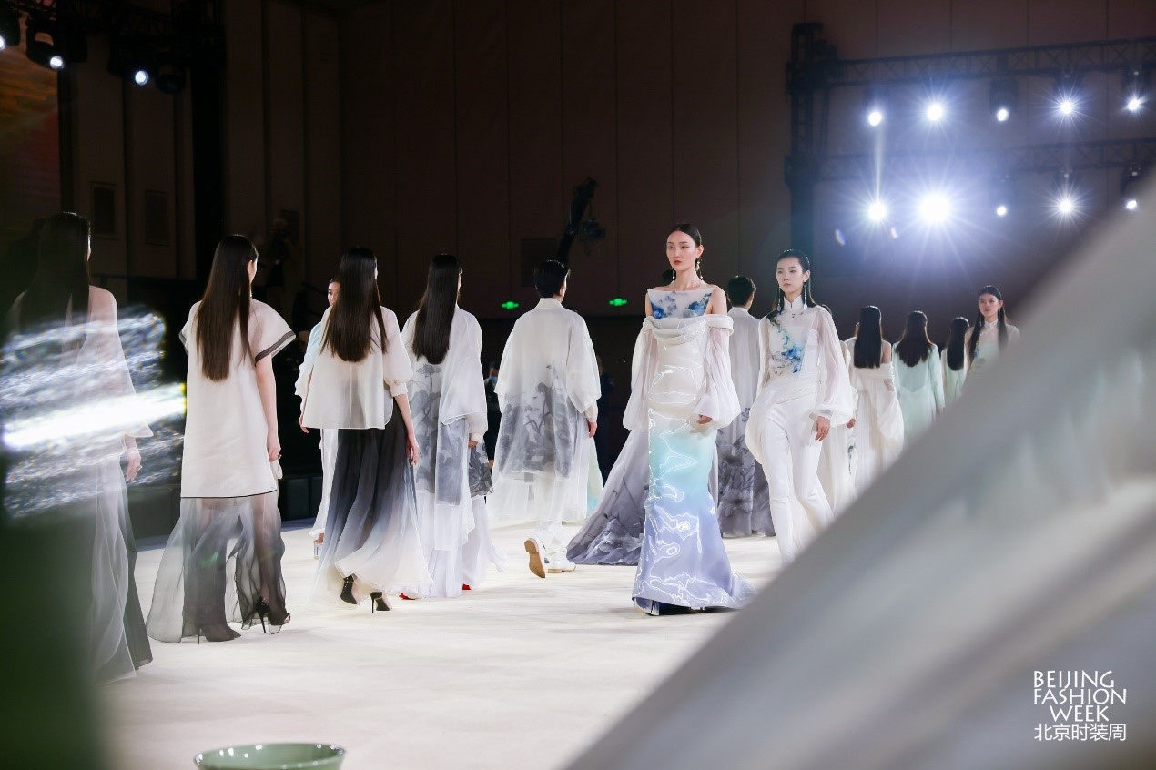 Models showcase designer Xiong Ying's latest collection at the AW2024 Beijing Fashion Week on March 18, 2024. /Photo provided to CGTN