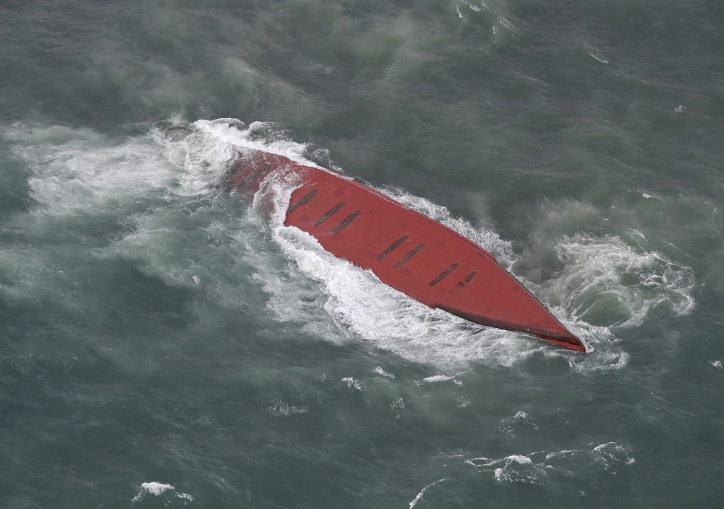 An aerial photo shows capsized tanker off Mutsure-jima Island, Yamaguchi Prefecture, Japan, March 20, 2024. /CFP