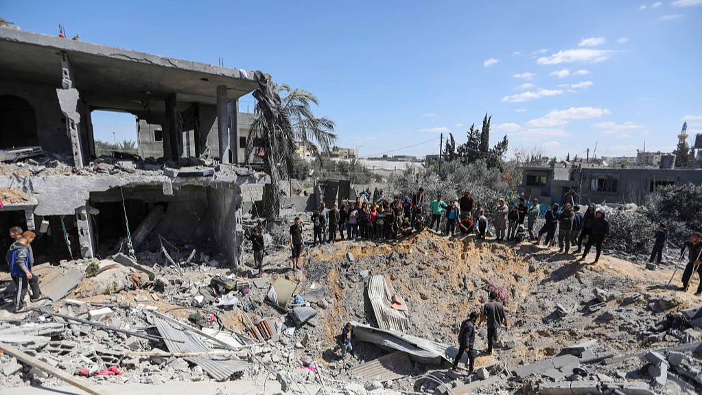 People inspect damage and recover items from their homes following Israeli air strikes in Rafah, Gaza, March 20, 2024. /CFP