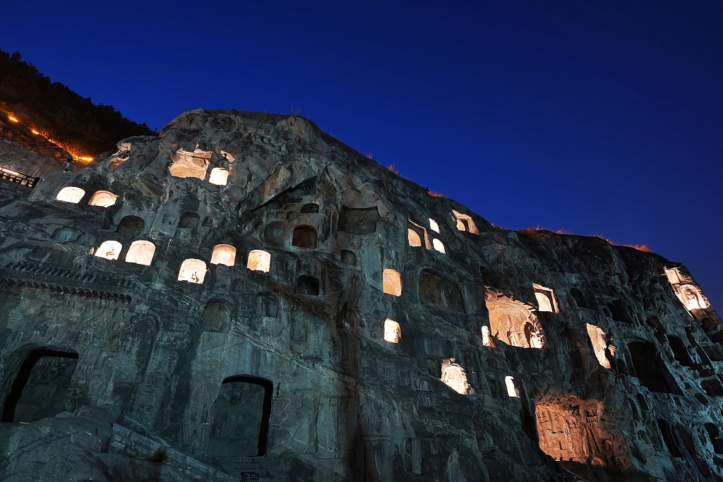 A photo taken on March 20, 2024 shows a night view of the Longmen Grottoes in Luoyang, Henan Province. /CFP
