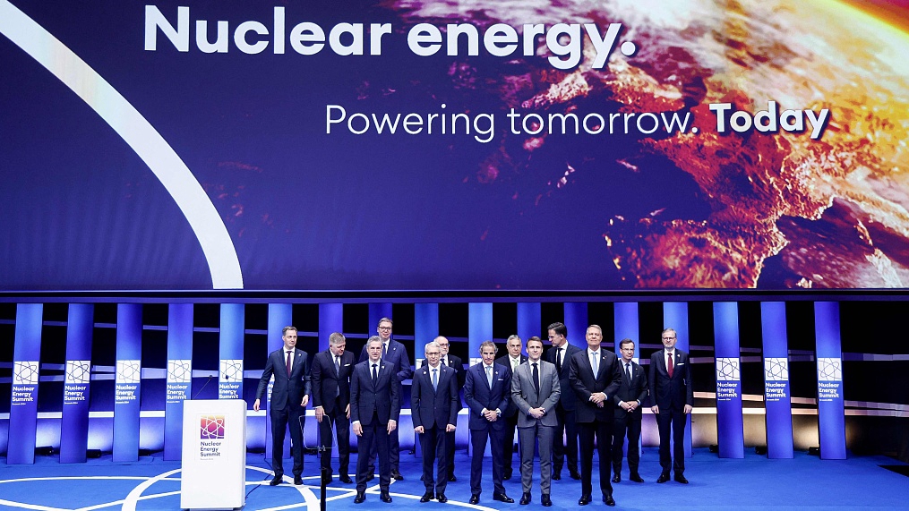 Heads of states and governments stand on stage during the International Atomic Energy Agency Nuclear Energy Summit, Brussels, March 21, 2024. /CFP