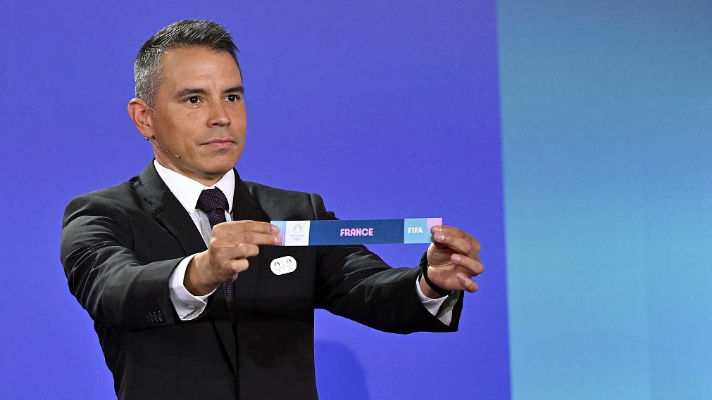 Former Footballer Javier Saviola pulls France from the pot during the Olympic football tournament final draw in Paris, France, March 20, 2024. /CFP