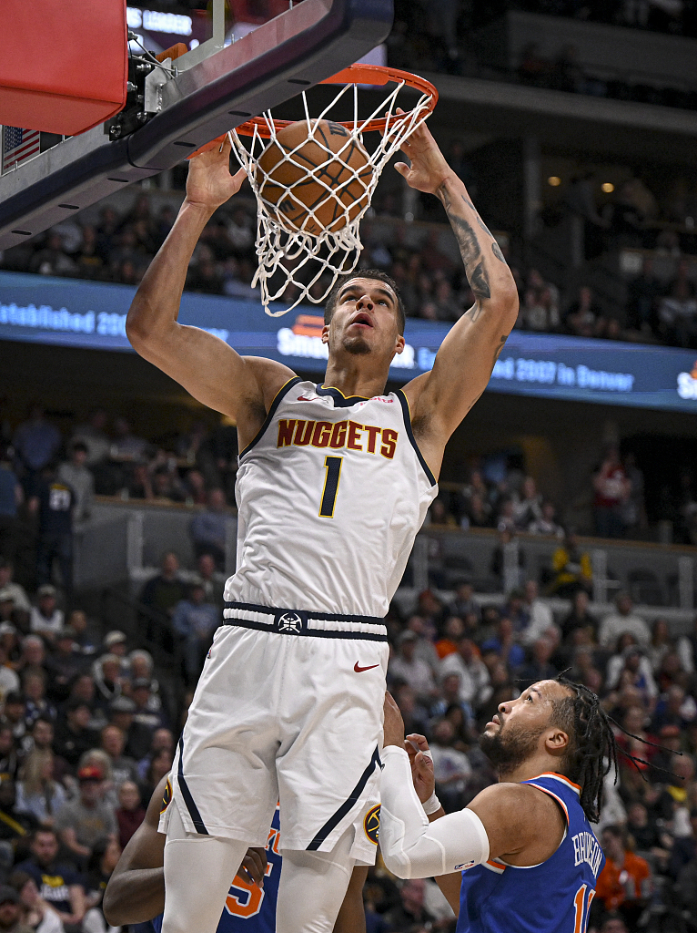 Michael Porter Jr. (#1) of the Denver Nuggets dunks in the game against the New York Knicks at Ball Arena in Denver, Colorado, March 21, 2024. /CFP